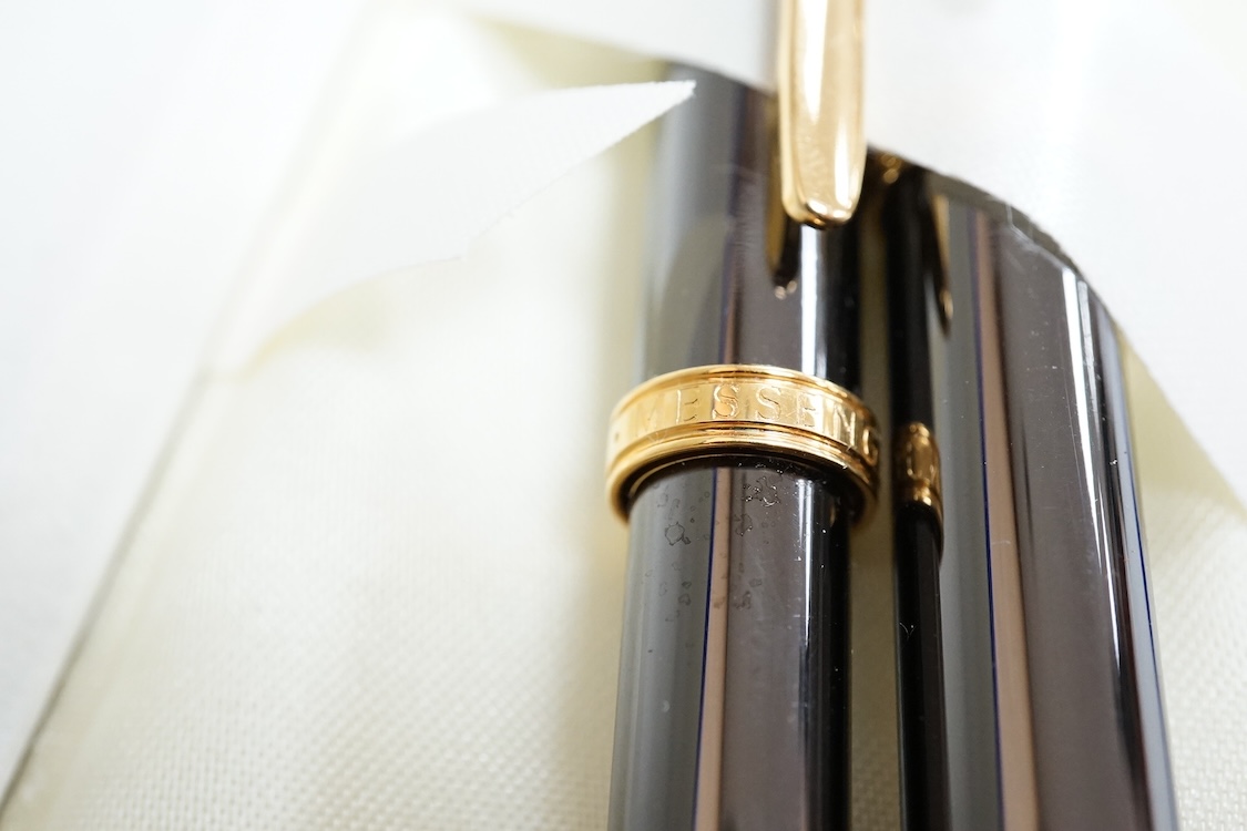 A cased Messenger pen and pencil set, a Waterman pen, etc.